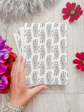 Load image into Gallery viewer, Hamsa Hand Notebook | Designed by Lauren Emmeline | Eco-Friendly 100% Recycled Cover &amp; Pages - Sunbeam Naturals
